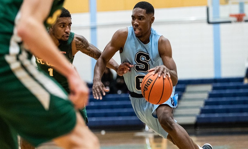 Men's basketball win high-scoring affair in regular season opener